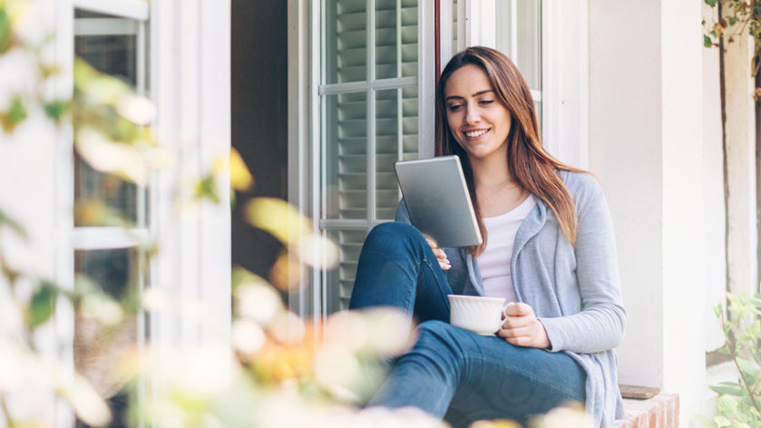 woman reading tablet