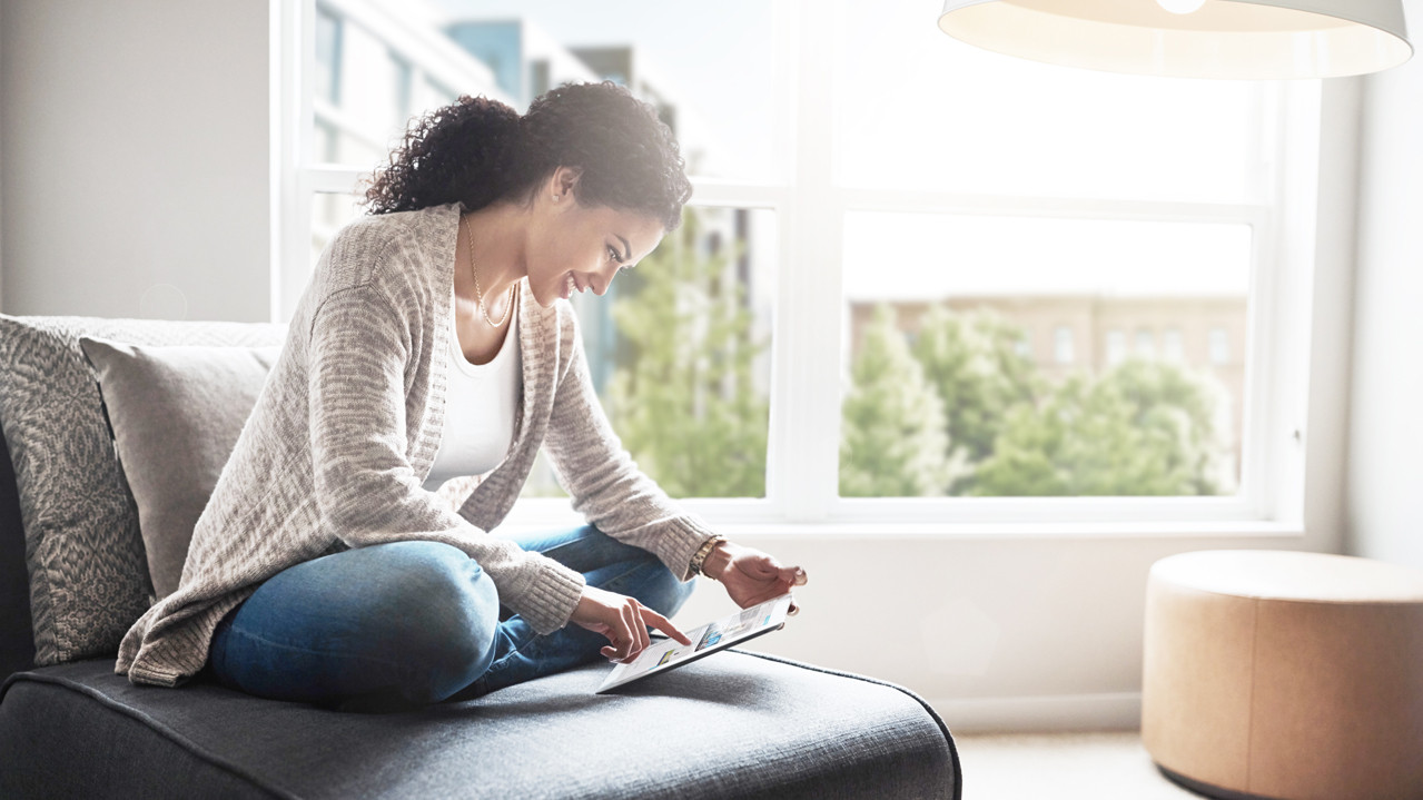 Woman reading Ipad